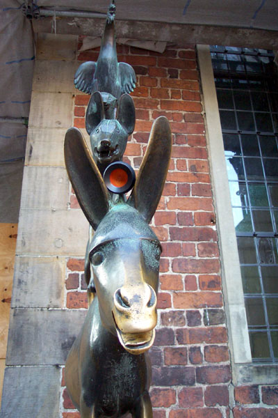 seed pod on the head of a bronze donkey
