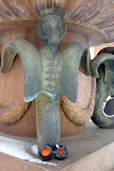 seed pod on the head of a bronze donkey